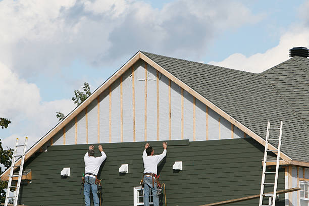 Professional Siding technician working in Walkertown, NC